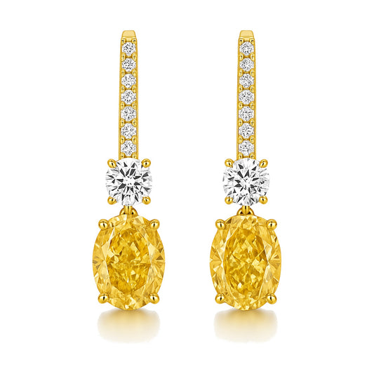 Solange earrings in 14K yellow gold with a fancy yellow oval-cut lab-grown diamond