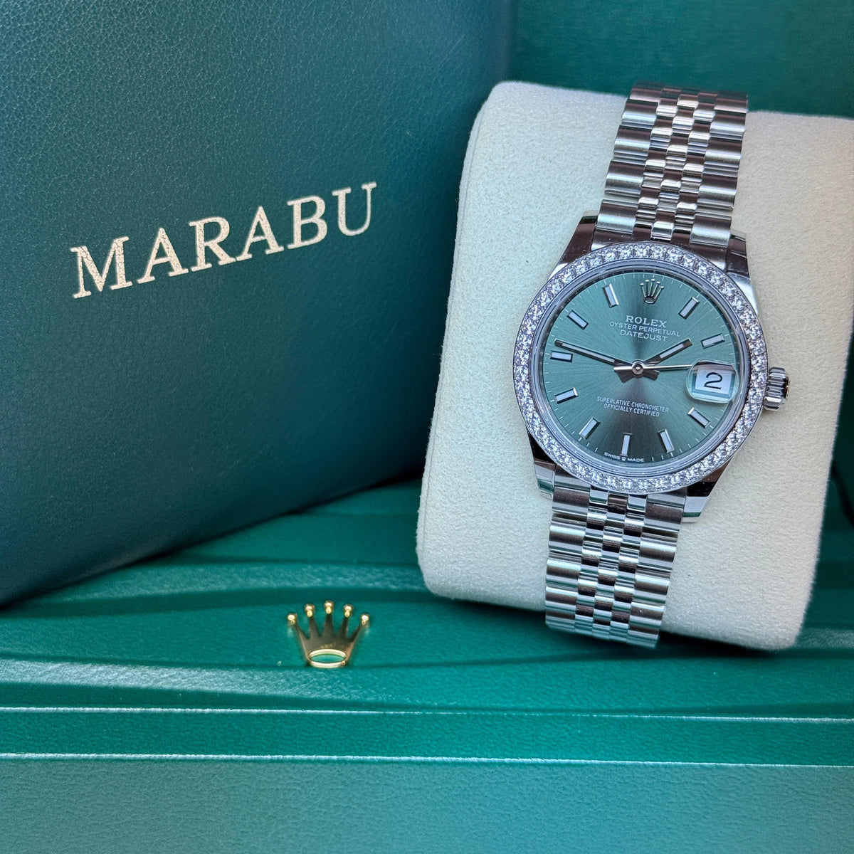 שעון Rolex Datejust 31 עם לוח מנטה ומסגרת משובצת יהלומים, בקופסת רולקס