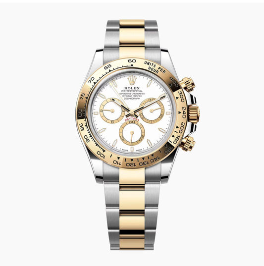 Rolex Cosmograph Daytona in Yellow Rolesor with a white dial and three sub-dials